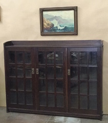 Rare Gustav Stickley Early triple door mitered mullion bookcase, original finish, signed. 1902-1903